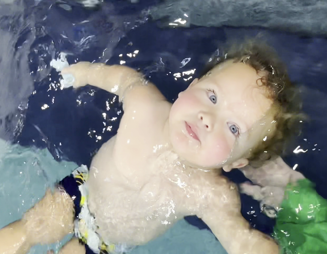 A picture of a 18 month old swimmer from Thistledown Swim Academy